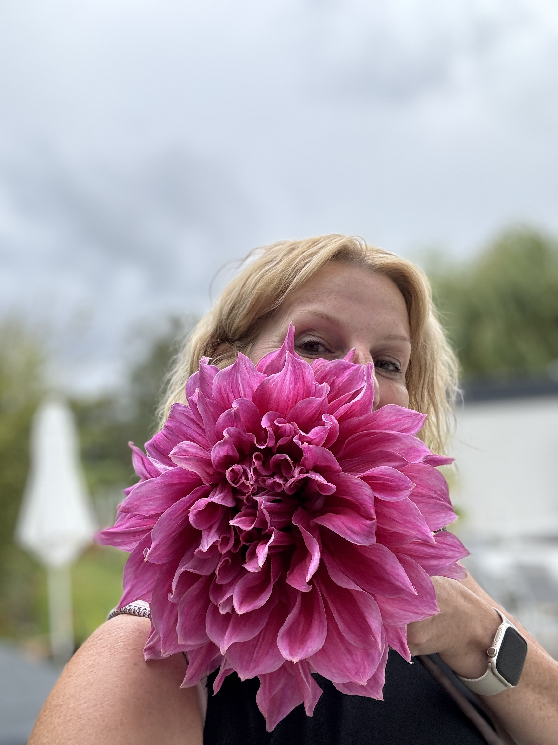Person carrying flowers